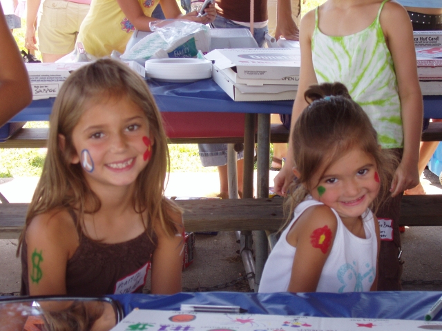 Kamry & Kinsey Snyder (2 of Kevin Snyders daughters) smile for the camera and show off their face painting.